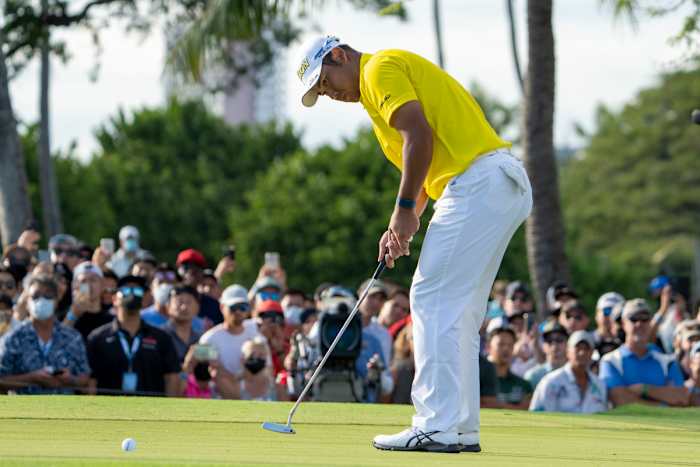 Hideki Matsuyama wields a Scotty Cameron Timeless Newport 2 GSS tour prototype putter.